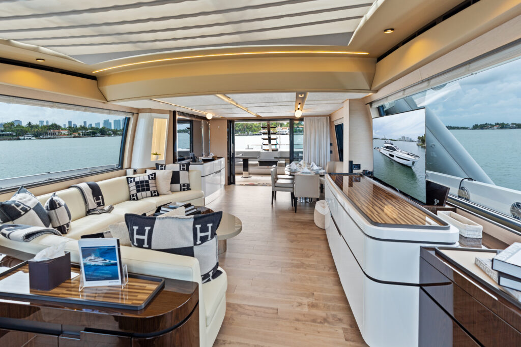 Elegant sun-drenched salon interior aboard 94 Azimut luxury yacht