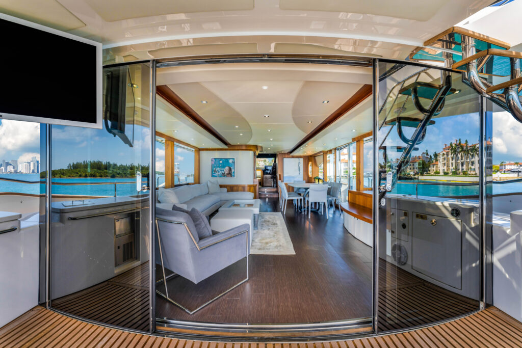 Chic salon with panoramic windows aboard 96 Sunseeker luxury yacht