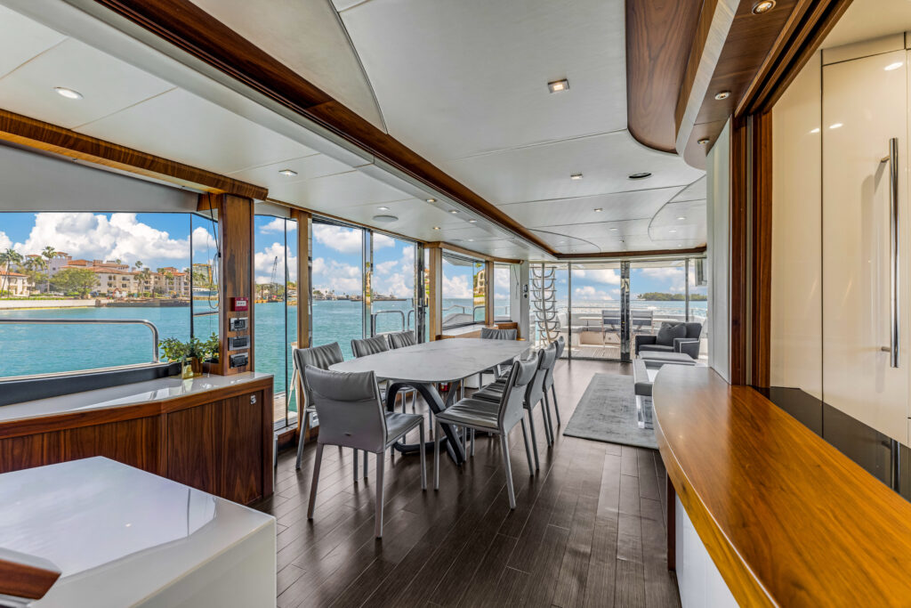 Chic salon with panoramic windows aboard 96 Sunseeker luxury yacht