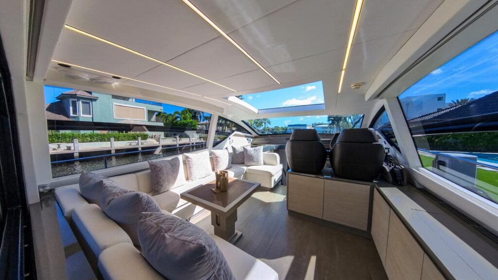 Modern bright salon interior aboard 62 Pershing luxury yacht