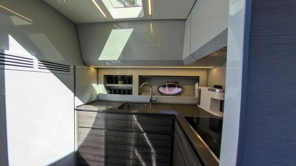 Fully equipped galley kitchen on Pershing yacht Miami