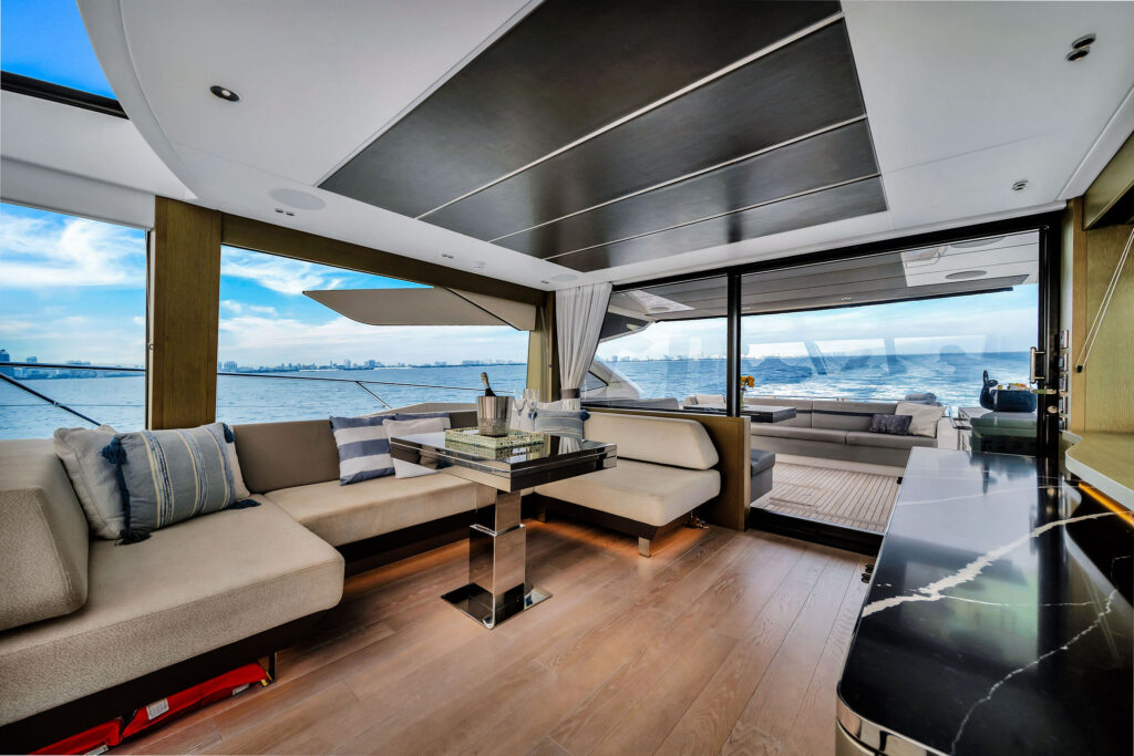 Contemporary luxury salon interior with plush seating and ambient lighting aboard Sunseeker Predator Miami