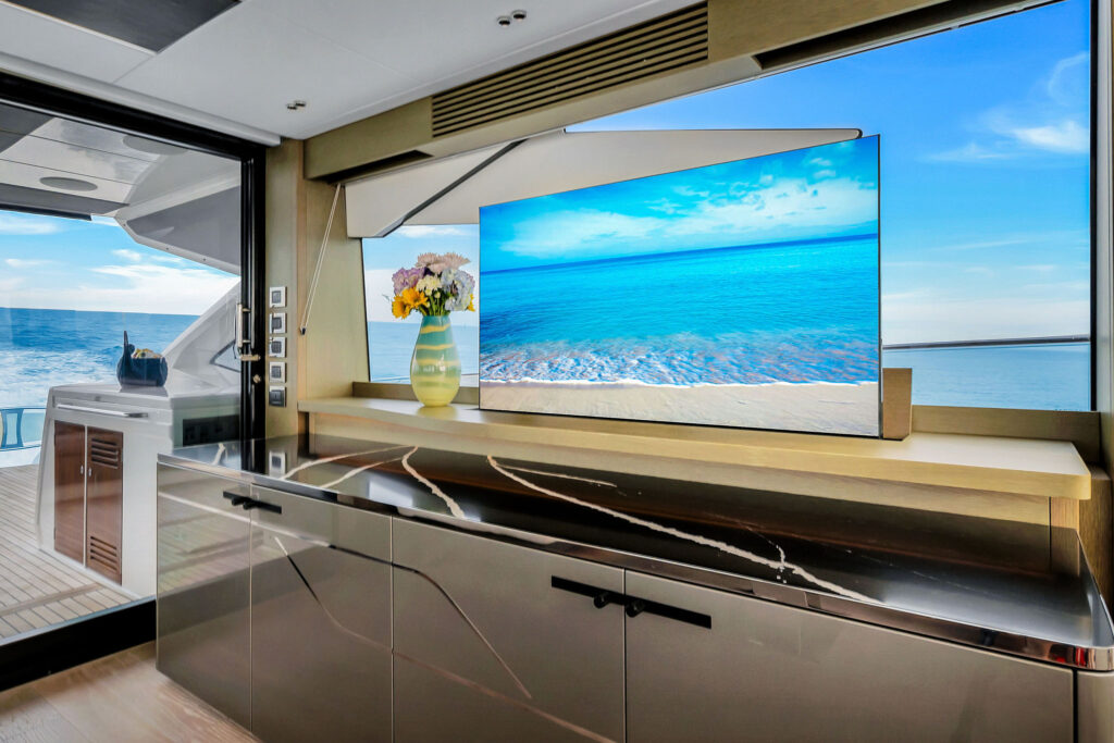 Contemporary luxury salon interior with plush seating and ambient lighting aboard Sunseeker Predator Miami