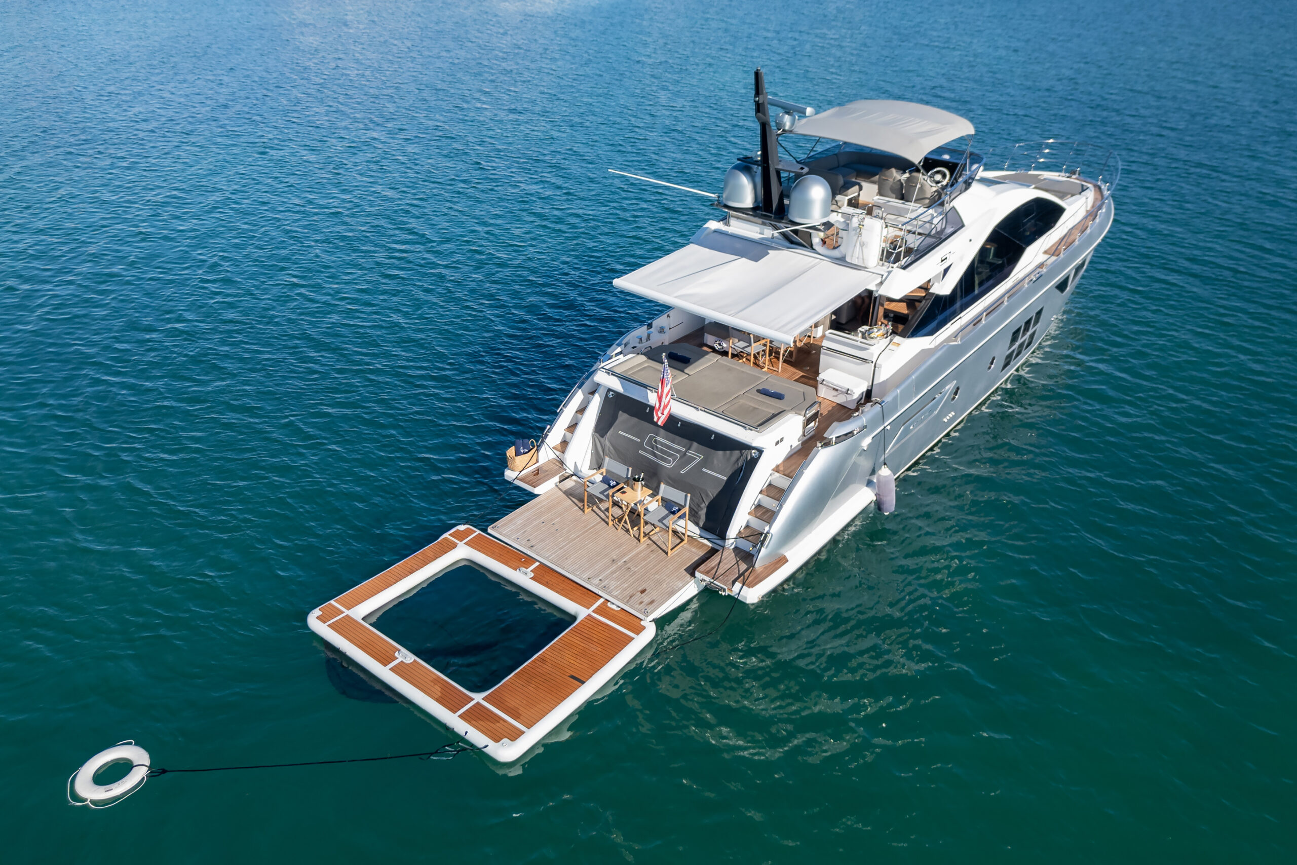 Comfortable aft deck seating area for dining and socializing on 72-foot Azimut yacht Miami