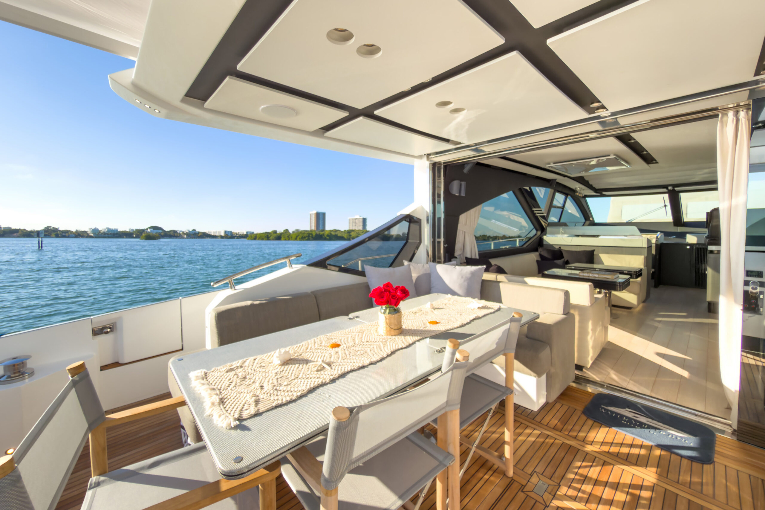 Comfortable aft deck seating area for dining and socializing on 72-foot Azimut yacht Miami