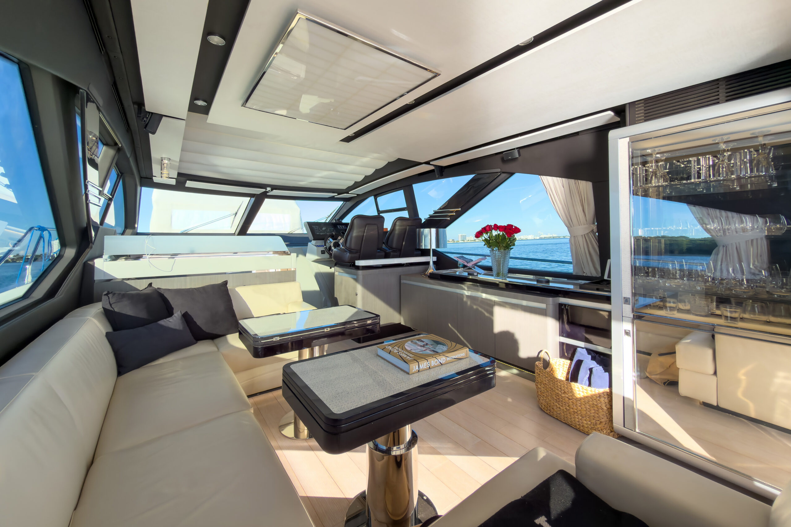 Bright modern salon with plush seating and expansive windows aboard Azimut 7S Ocean Flair